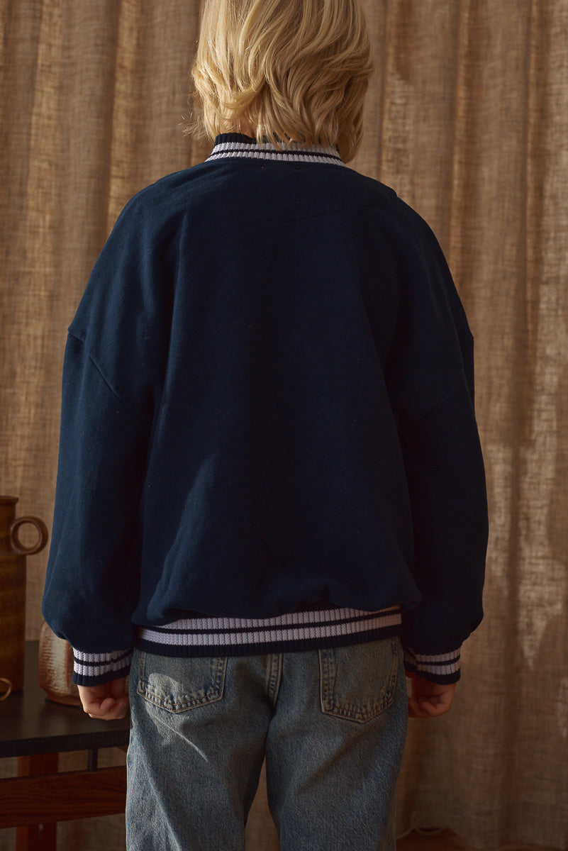 Vue de dos blouson teddy bleu marine garçon Marlot Paris